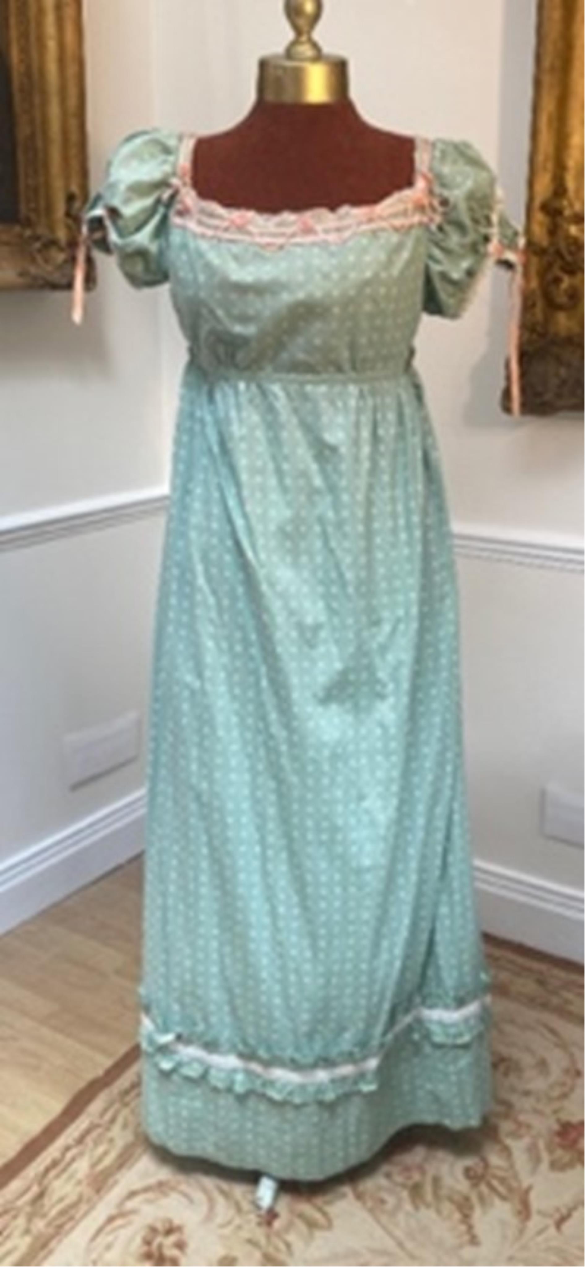 A green patterned cotton Regency style day-dress. Size 12 to 16